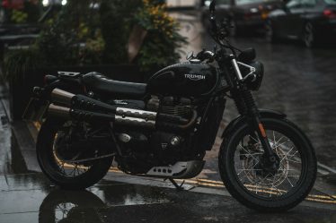 a motorcycle parked on the side of the road